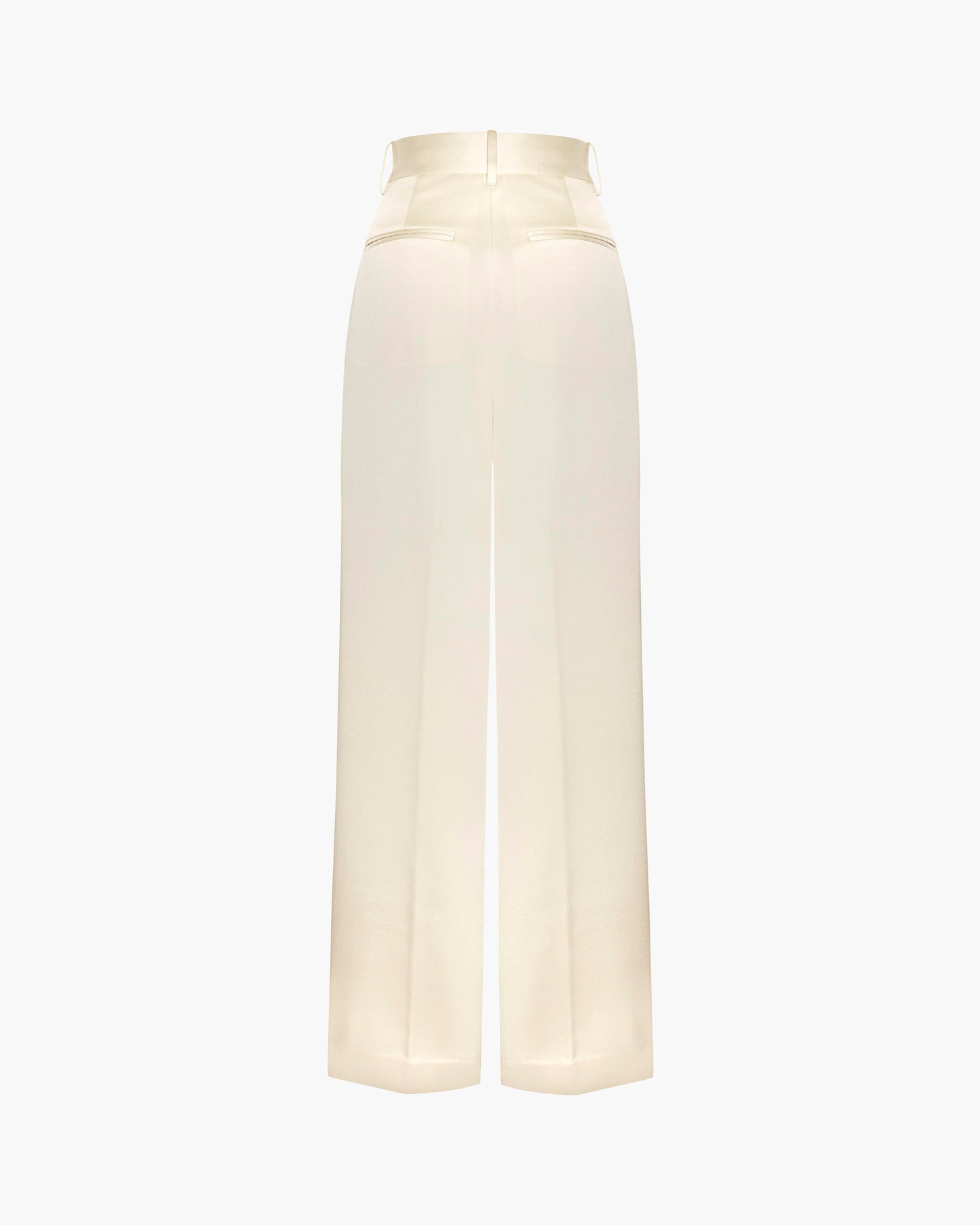 Custard satin pants on a white background