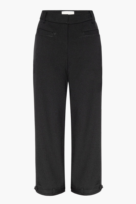Black capri pants with front and back pockets and adjustable belt detail at the hem on a white background