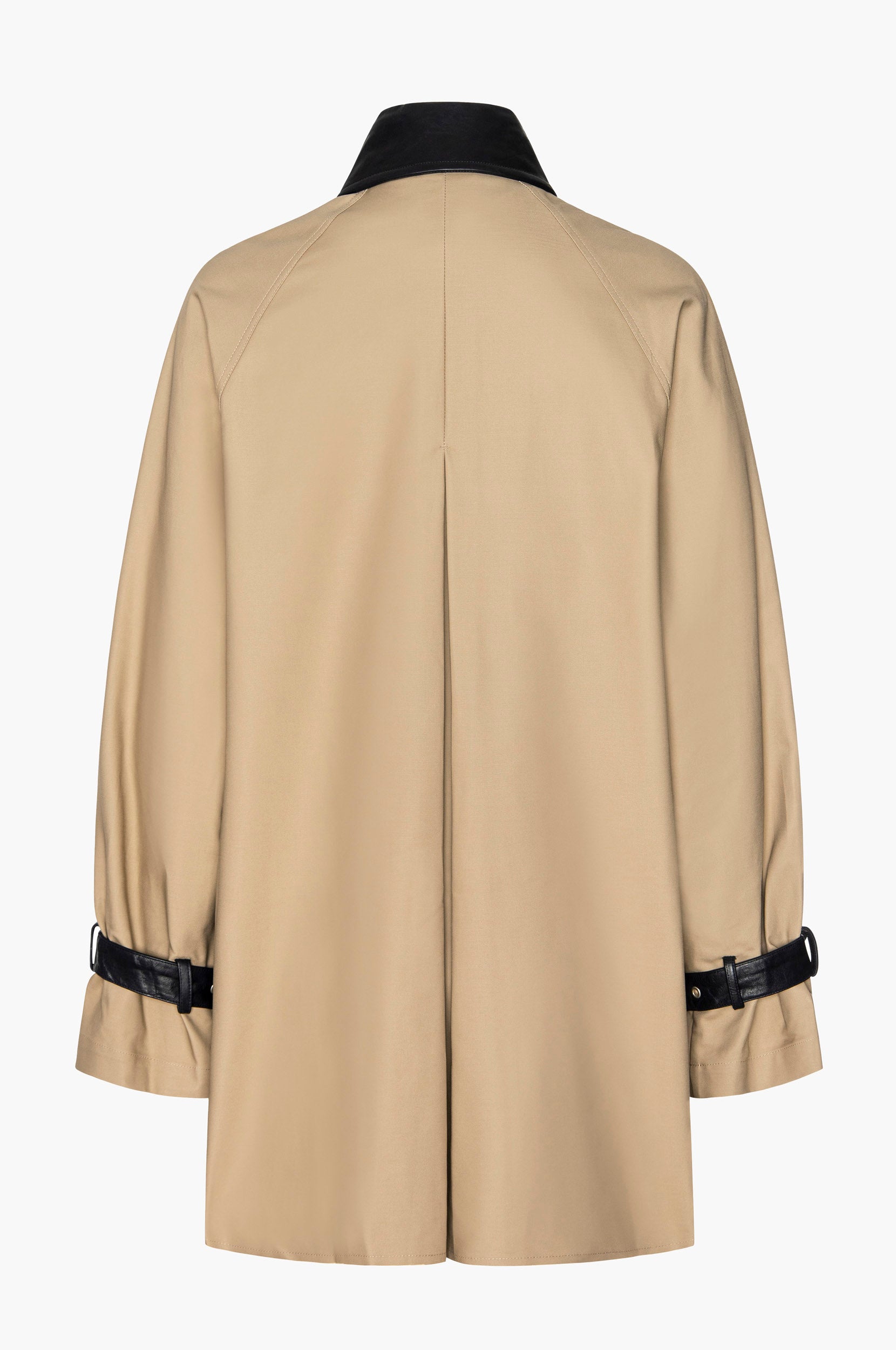Beige mini trench coat with black leather collar and belted cuff accents on a white background