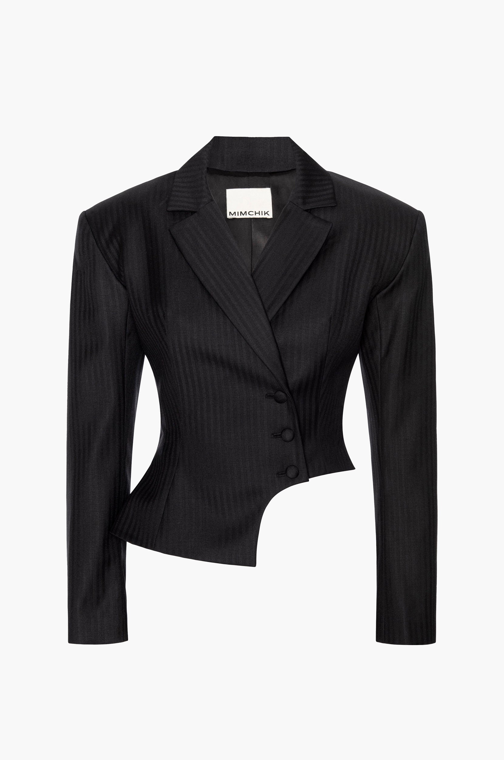 A double-breasted, herringbone virgin wool blazer with bold shoulders, notched lapels, and a curved hip cutout on a white background