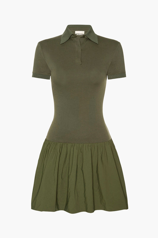 Short sleeve green mini dress with a polo collar and bubble hem on a white background
