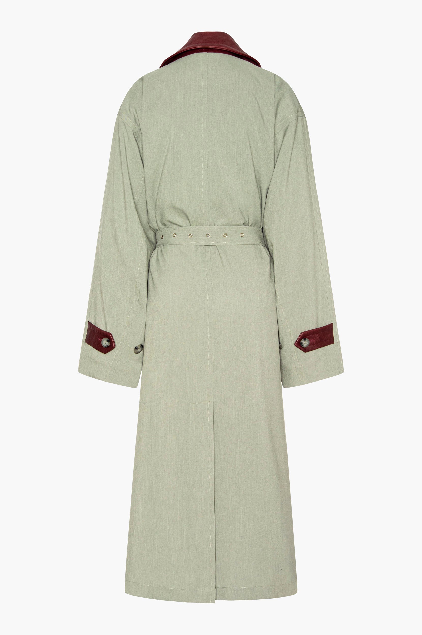 Seafoam green trench coat with a burgundy leather collar and cuffs on a white background