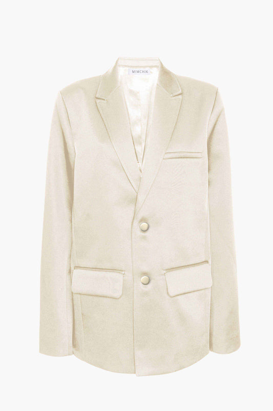 Beige blazer on a white background