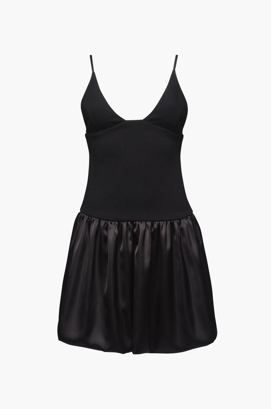 Black mini dress with a bubble hem on a white background