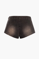 Black denim shorts on a white background