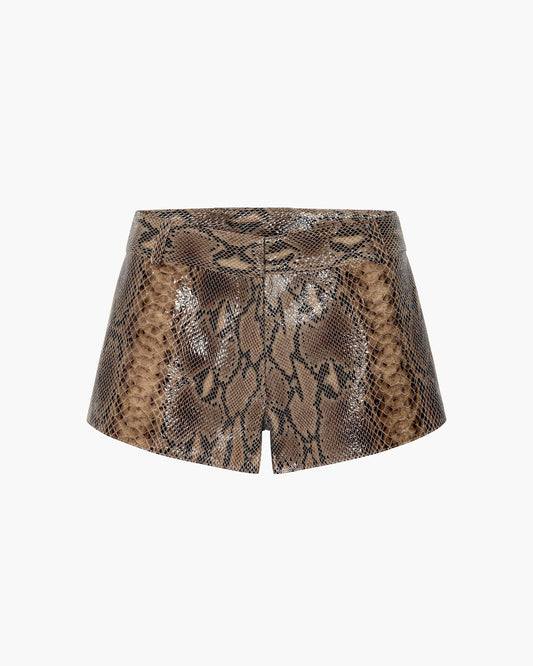 A pair of brown and beige snakeskin patterned leather shorts, displayed against a solid white background.