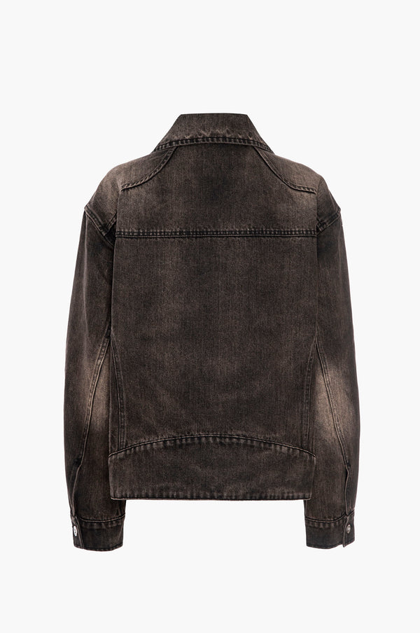 Back view of a black distressed denim jacket on a white background