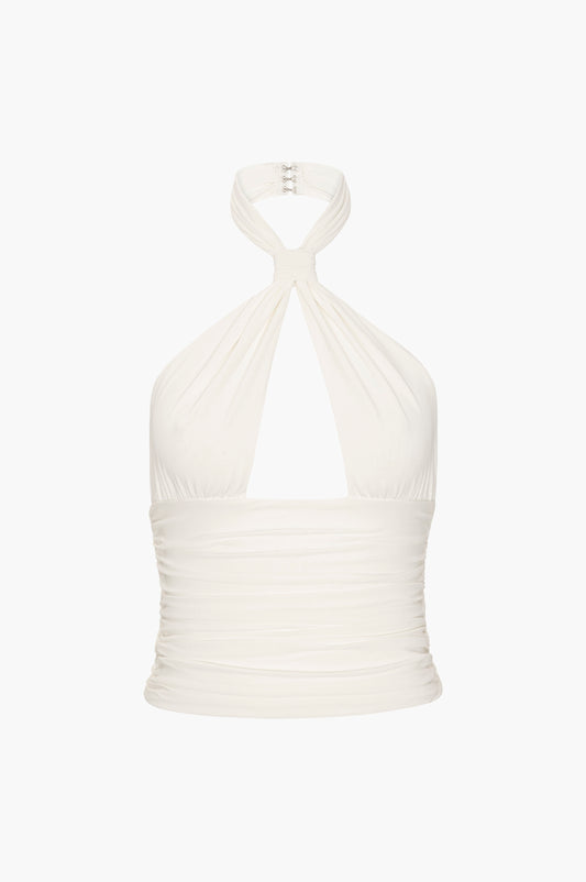 Vanilla white halter top on a light beige background