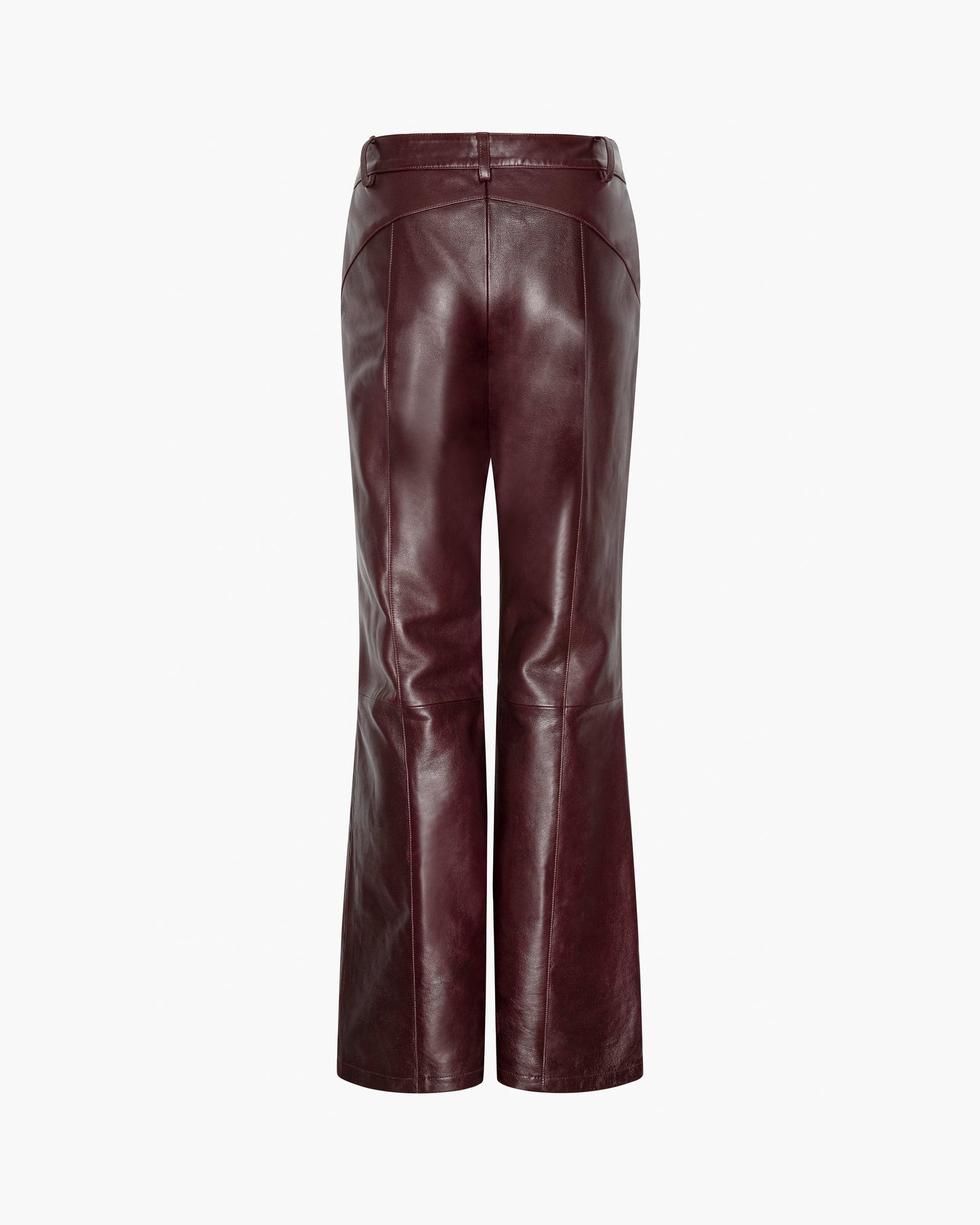 Back of burgundy leather pants on a white background