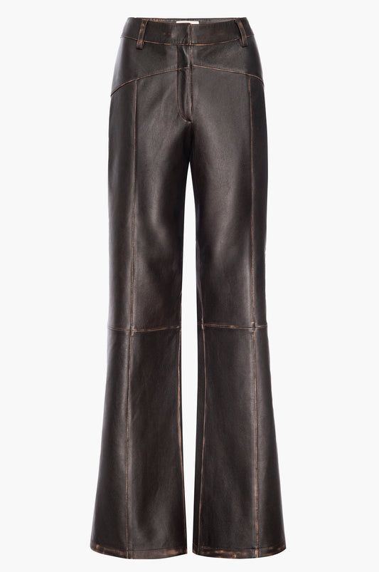Dark brown leather pants on a white background