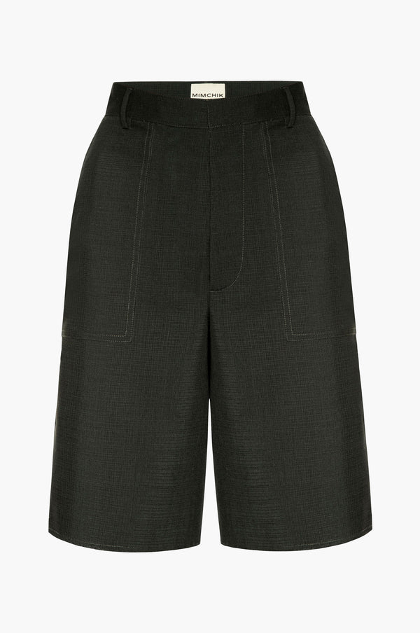 Dark green shorts on a white background