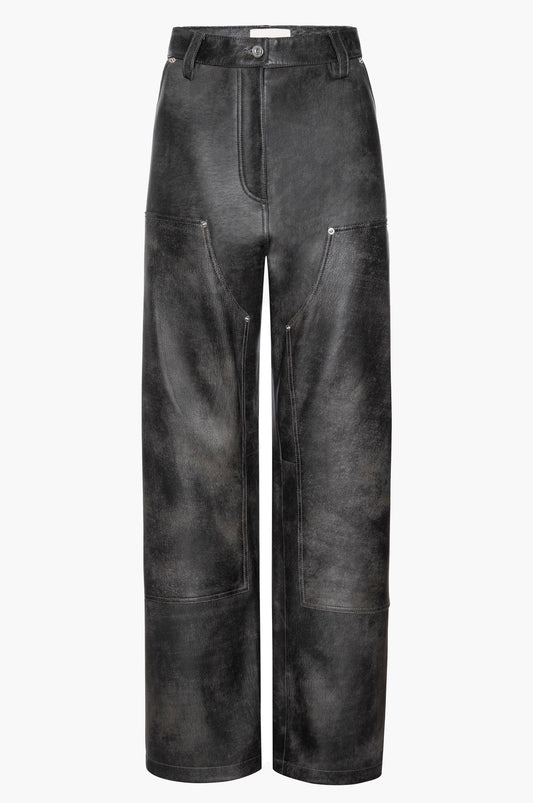 Black leather carpenter pants on a white background
