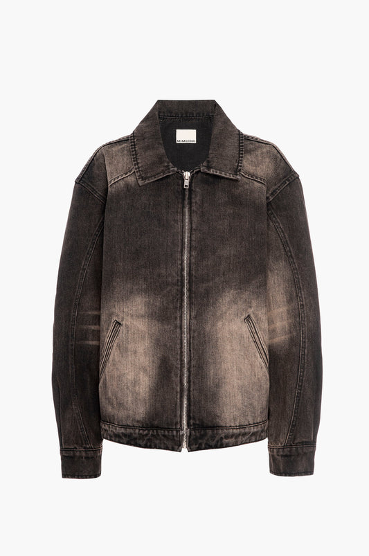 Black distressed denim jacket on a white background